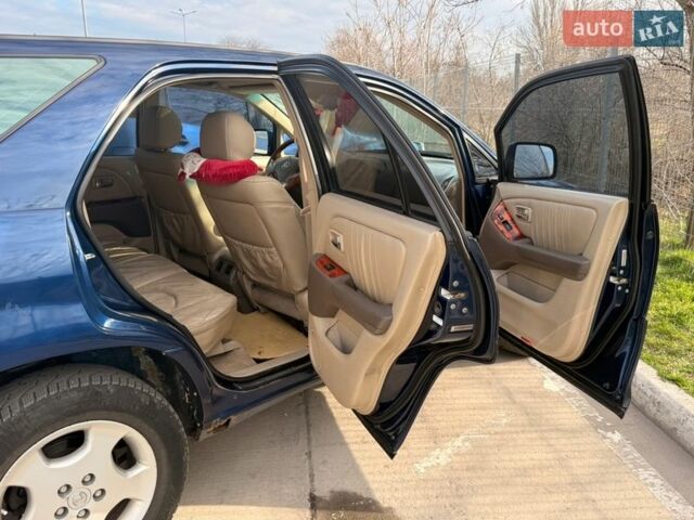 Синий Лексус РХ, объемом двигателя 3 л и пробегом 470 тыс. км за 4500 $, фото 4 на Automoto.ua