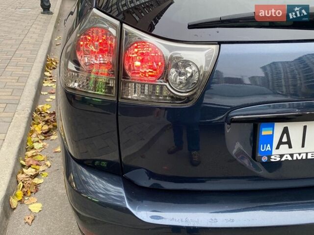 Синий Лексус РХ, объемом двигателя 3 л и пробегом 270 тыс. км за 7500 $, фото 1 на Automoto.ua