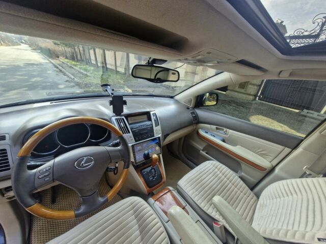 Синій Лексус РХ, об'ємом двигуна 3.3 л та пробігом 303 тис. км за 7800 $, фото 5 на Automoto.ua