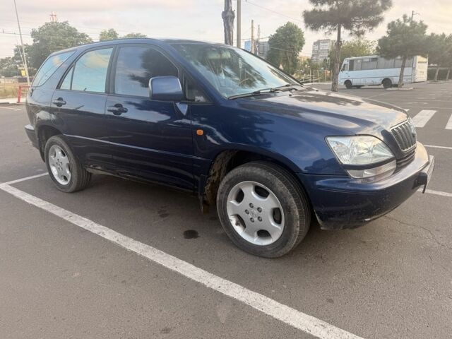 Синий Лексус РХ, объемом двигателя 3 л и пробегом 470 тыс. км за 5509 $, фото 3 на Automoto.ua