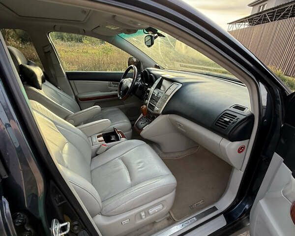 Синий Лексус РХ, объемом двигателя 3 л и пробегом 337 тыс. км за 8300 $, фото 7 на Automoto.ua
