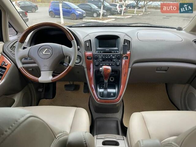 Синій Лексус РХ, об'ємом двигуна 3 л та пробігом 463 тис. км за 5490 $, фото 64 на Automoto.ua