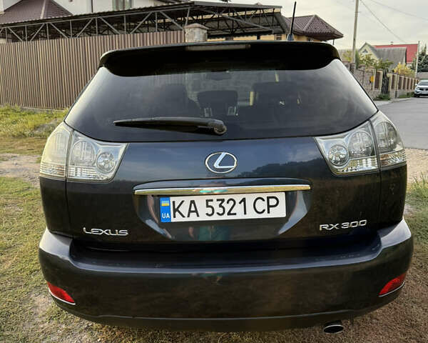 Синий Лексус РХ, объемом двигателя 3 л и пробегом 337 тыс. км за 8300 $, фото 5 на Automoto.ua