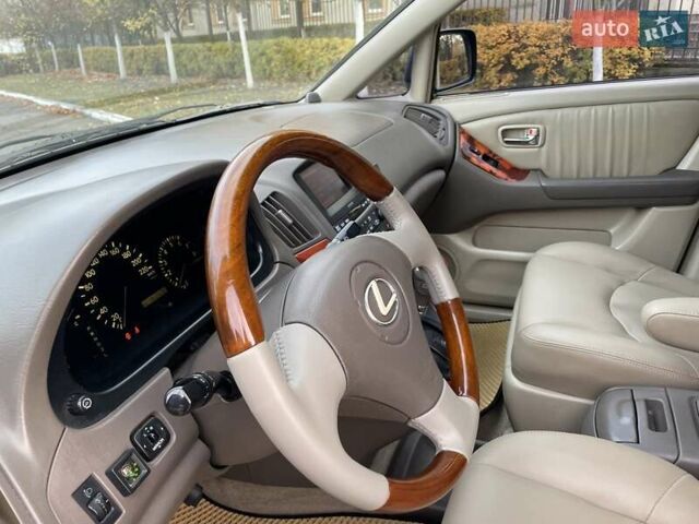 Синій Лексус РХ, об'ємом двигуна 3 л та пробігом 463 тис. км за 5490 $, фото 34 на Automoto.ua