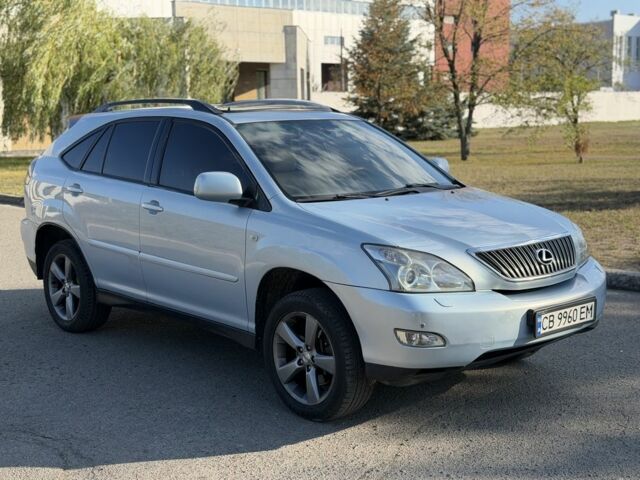 Синий Лексус РХ, объемом двигателя 3.3 л и пробегом 261 тыс. км за 6820 $, фото 2 на Automoto.ua