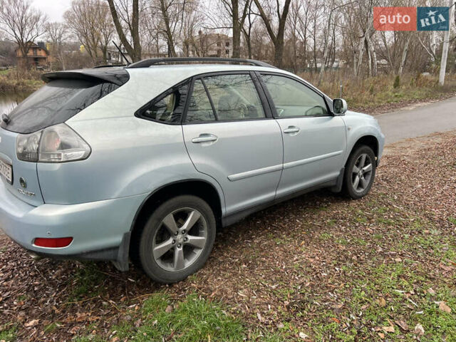 Синий Лексус РХ, объемом двигателя 3.31 л и пробегом 400 тыс. км за 7500 $, фото 2 на Automoto.ua