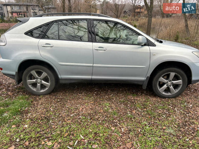 Синий Лексус РХ, объемом двигателя 3.31 л и пробегом 400 тыс. км за 7500 $, фото 3 на Automoto.ua