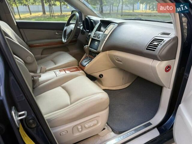 Синий Лексус РХ, объемом двигателя 3 л и пробегом 270 тыс. км за 8299 $, фото 4 на Automoto.ua
