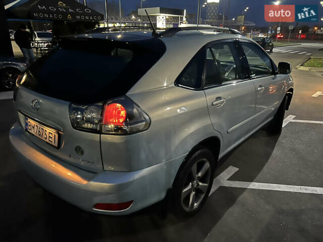 Синий Лексус РХ, объемом двигателя 3.3 л и пробегом 250 тыс. км за 7650 $, фото 1 на Automoto.ua