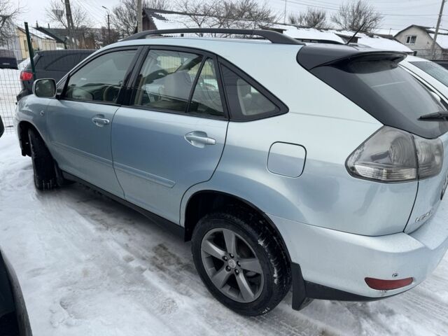 Синий Лексус РХ, объемом двигателя 3.3 л и пробегом 245 тыс. км за 7200 $, фото 1 на Automoto.ua