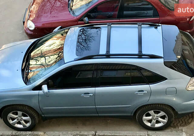 Синий Лексус РХ, объемом двигателя 3.3 л и пробегом 284 тыс. км за 9500 $, фото 4 на Automoto.ua