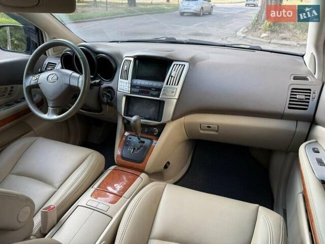 Синий Лексус РХ, объемом двигателя 3 л и пробегом 270 тыс. км за 8299 $, фото 5 на Automoto.ua