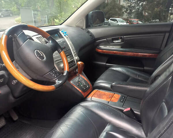 Синий Лексус РХ, объемом двигателя 3.3 л и пробегом 284 тыс. км за 9500 $, фото 5 на Automoto.ua