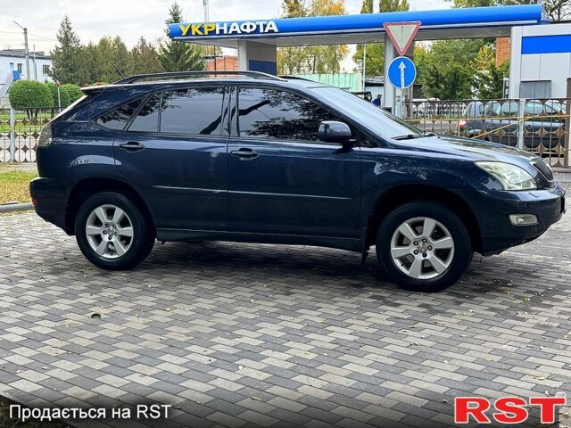 Синій Лексус РХ, об'ємом двигуна 3.3 л та пробігом 265 тис. км за 6999 $, фото 3 на Automoto.ua