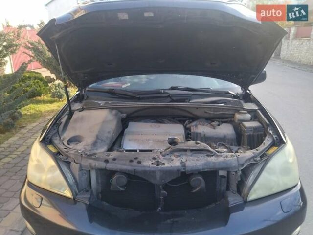 Синий Лексус РХ, объемом двигателя 3.3 л и пробегом 351 тыс. км за 7000 $, фото 3 на Automoto.ua