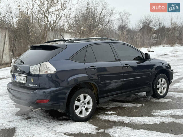 Синий Лексус РХ, объемом двигателя 3.3 л и пробегом 351 тыс. км за 8450 $, фото 3 на Automoto.ua