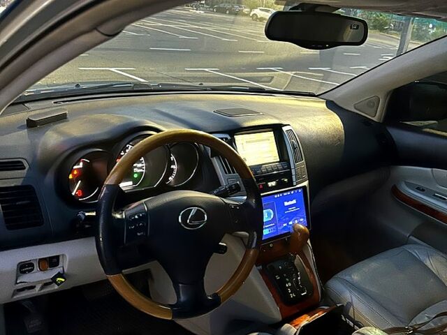 Синій Лексус РХ, об'ємом двигуна 3.3 л та пробігом 0 тис. км за 8000 $, фото 10 на Automoto.ua
