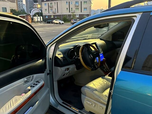Синій Лексус РХ, об'ємом двигуна 3.3 л та пробігом 0 тис. км за 8000 $, фото 9 на Automoto.ua