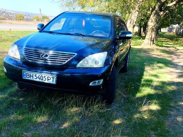 Синий Лексус РХ, объемом двигателя 3.3 л и пробегом 268 тыс. км за 9300 $, фото 2 на Automoto.ua