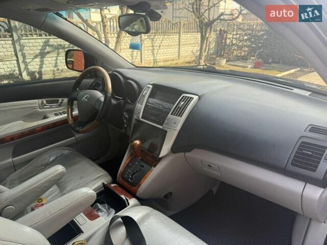 Синий Лексус РХ, объемом двигателя 3.3 л и пробегом 352 тыс. км за 9800 $, фото 4 на Automoto.ua