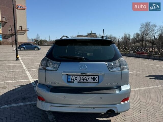 Синий Лексус РХ, объемом двигателя 3.5 л и пробегом 257 тыс. км за 11200 $, фото 3 на Automoto.ua