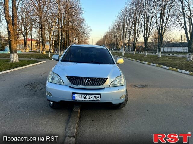Синій Лексус РХ, об'ємом двигуна 3.5 л та пробігом 257 тис. км за 10100 $, фото 1 на Automoto.ua