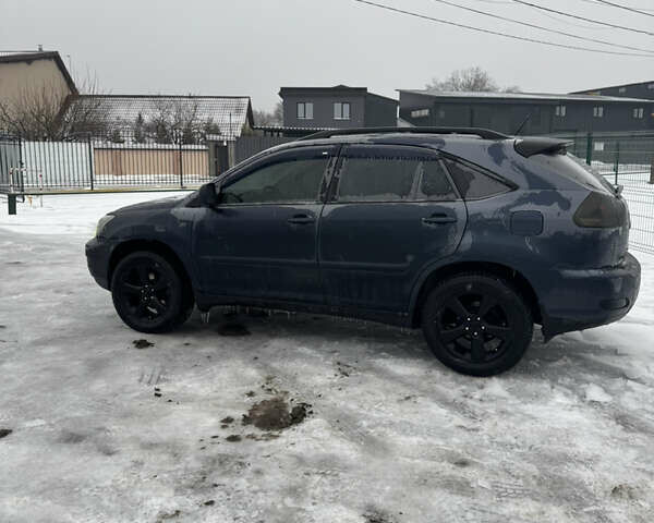 Синий Лексус РХ, объемом двигателя 3.46 л и пробегом 295 тыс. км за 8300 $, фото 4 на Automoto.ua