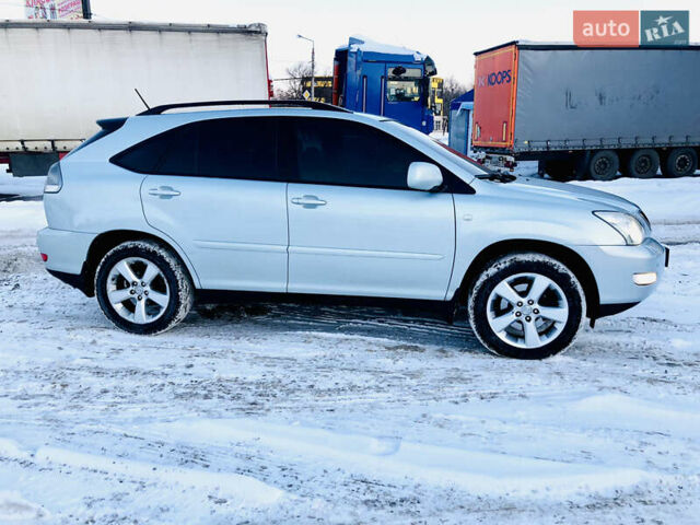 Синій Лексус РХ, об'ємом двигуна 3.46 л та пробігом 244 тис. км за 9000 $, фото 7 на Automoto.ua