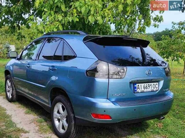Синий Лексус РХ, объемом двигателя 3.3 л и пробегом 279 тыс. км за 10300 $, фото 4 на Automoto.ua