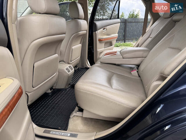 Синий Лексус РХ, объемом двигателя 3.46 л и пробегом 220 тыс. км за 10650 $, фото 29 на Automoto.ua