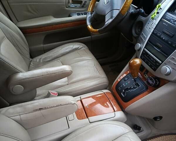 Синий Лексус РХ, объемом двигателя 3.3 л и пробегом 279 тыс. км за 10300 $, фото 2 на Automoto.ua