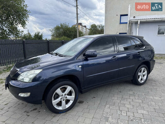 Синий Лексус РХ, объемом двигателя 3.46 л и пробегом 220 тыс. км за 10650 $, фото 1 на Automoto.ua