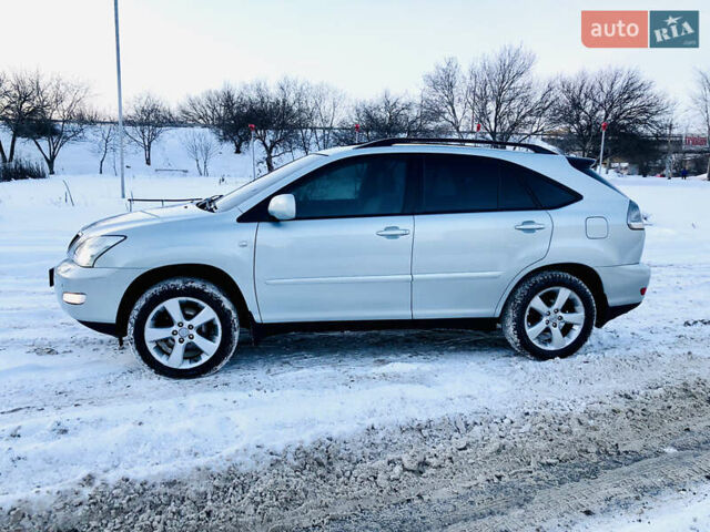 Синій Лексус РХ, об'ємом двигуна 3.46 л та пробігом 244 тис. км за 9000 $, фото 3 на Automoto.ua