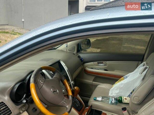 Синий Лексус РХ, объемом двигателя 3.46 л и пробегом 276 тыс. км за 12700 $, фото 3 на Automoto.ua