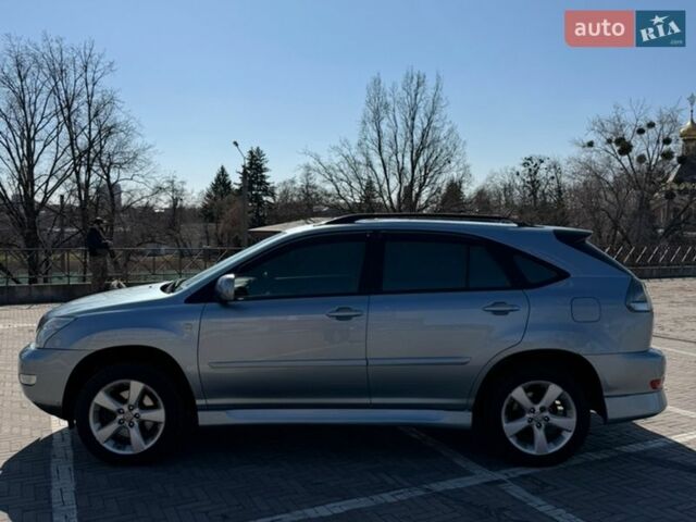 Синий Лексус РХ, объемом двигателя 3.5 л и пробегом 257 тыс. км за 11200 $, фото 5 на Automoto.ua