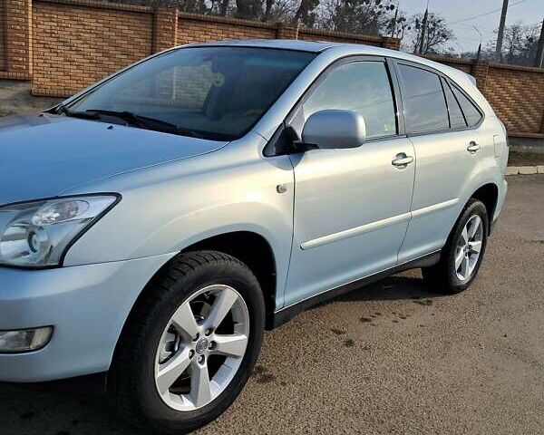 Синий Лексус РХ, объемом двигателя 3 л и пробегом 194 тыс. км за 9800 $, фото 5 на Automoto.ua