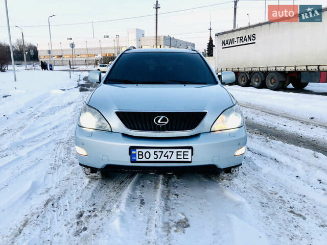 Синий Лексус РХ, объемом двигателя 3.46 л и пробегом 244 тыс. км за 9200 $, фото 1 на Automoto.ua