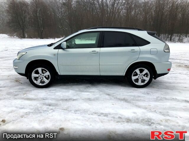 Синий Лексус РХ, объемом двигателя 3.5 л и пробегом 244 тыс. км за 9200 $, фото 3 на Automoto.ua