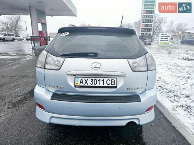 Синій Лексус РХ, об'ємом двигуна 3.5 л та пробігом 145 тис. км за 10500 $, фото 1 на Automoto.ua