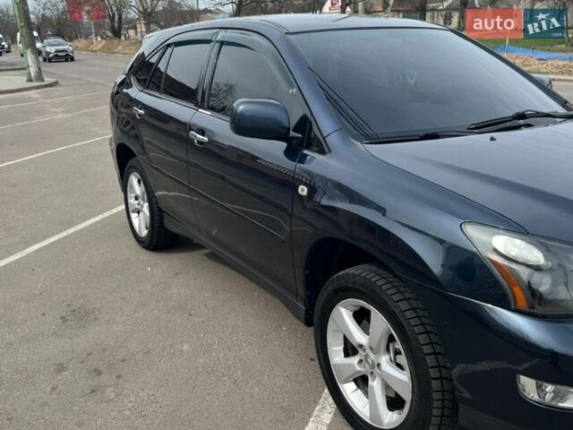 Синий Лексус РХ, объемом двигателя 3.46 л и пробегом 220 тыс. км за 13000 $, фото 1 на Automoto.ua