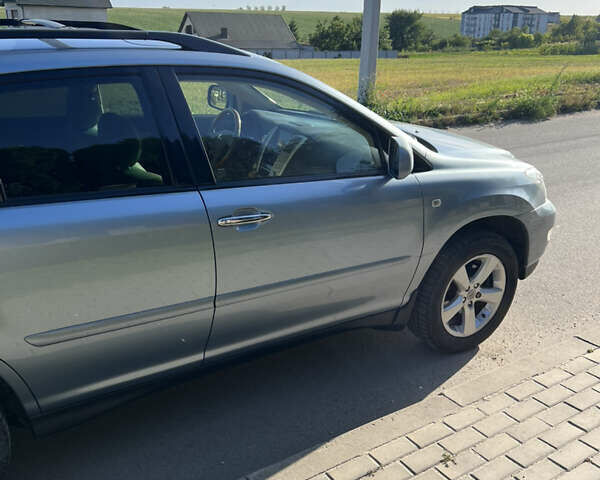 Синий Лексус РХ, объемом двигателя 3.5 л и пробегом 204 тыс. км за 13500 $, фото 7 на Automoto.ua