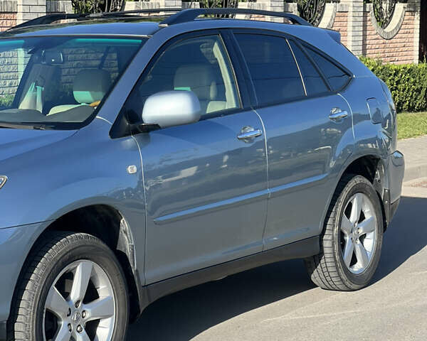 Синий Лексус РХ, объемом двигателя 3.5 л и пробегом 204 тыс. км за 13500 $, фото 6 на Automoto.ua