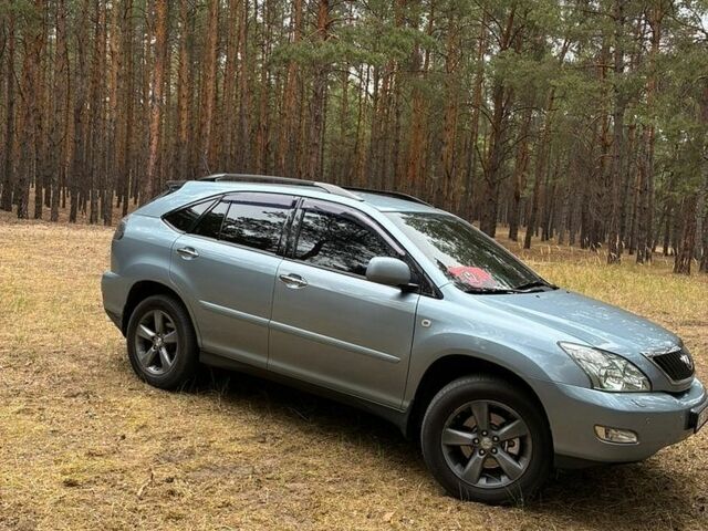 Синий Лексус РХ, объемом двигателя 3.46 л и пробегом 329 тыс. км за 14000 $, фото 3 на Automoto.ua