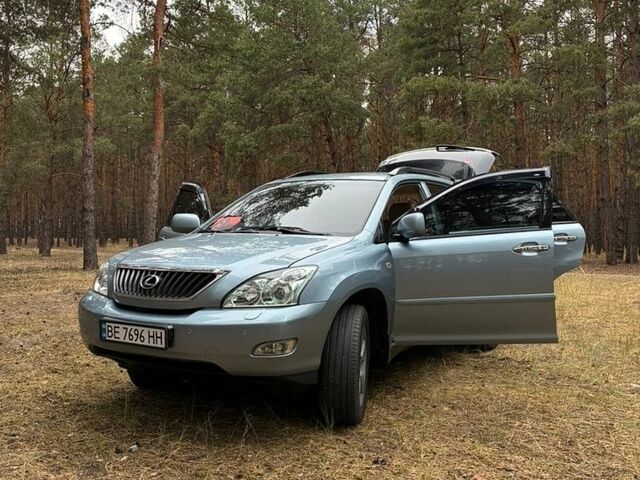 Синий Лексус РХ, объемом двигателя 3.46 л и пробегом 329 тыс. км за 14000 $, фото 2 на Automoto.ua