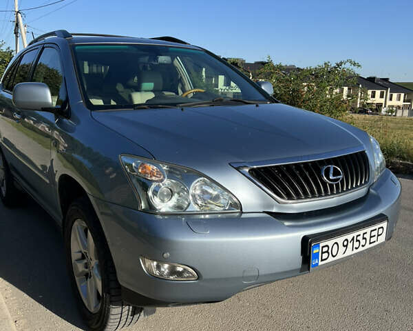Синий Лексус РХ, объемом двигателя 3.5 л и пробегом 204 тыс. км за 13500 $, фото 1 на Automoto.ua