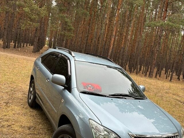 Синий Лексус РХ, объемом двигателя 3.46 л и пробегом 329 тыс. км за 14000 $, фото 1 на Automoto.ua