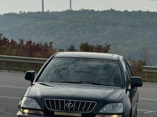 Зеленый Лексус РХ, объемом двигателя 3 л и пробегом 375 тыс. км за 5200 $, фото 12 на Automoto.ua