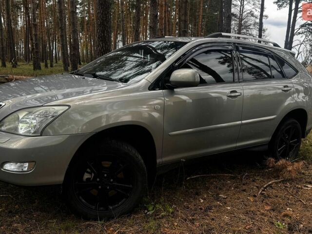 Зеленый Лексус РХ, объемом двигателя 3.46 л и пробегом 301 тыс. км за 12500 $, фото 3 на Automoto.ua
