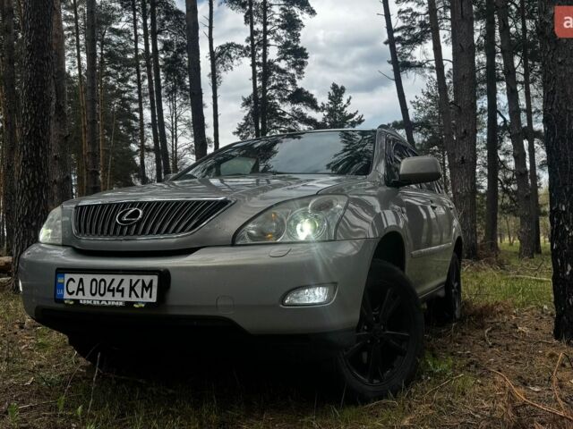 Зеленый Лексус РХ, объемом двигателя 3.46 л и пробегом 301 тыс. км за 12500 $, фото 1 на Automoto.ua