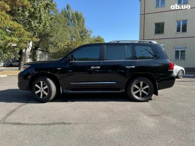 Черный Лексус LX 570, объемом двигателя 57 л и пробегом 153 тыс. км за 25490 $, фото 1 на Automoto.ua